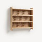 Shelve unit in oak wood. Three shelves. Woven wood back.