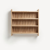 Shelve unit in oak wood. Three shelves. Woven wood back.