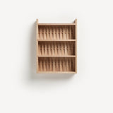 Shelve unit in ash wood. Three shelves. Woven wood back.