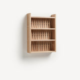 Shelve unit in ash wood. Three shelves. Woven wood back.