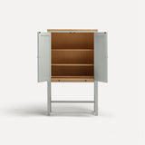 White painted two door shaker style cabinet on tall legs with oak work top. Doors open sliding shelf extended.