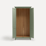 Green painted freestanding tall Armoire cupboard Shaker style with panelled doors and black metal knobs. Shown face on with both doors open.