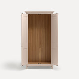 Pink painted freestanding tall Armoire cupboard Shaker style with panelled doors black metal knobs. Shown face on with both doors open.