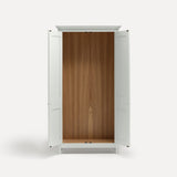 White painted freestanding tall Armoire cupboard Shaker style with panelled doors and black metal knobs. Shown face on with both doors open.