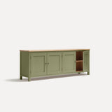 Green painted four door shaker style sideboard with black metal door knobs and oak worktop. Shown at an angle with one door open.
