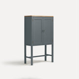 Blue painted two door shaker style cabinet on tall legs with oak work top.