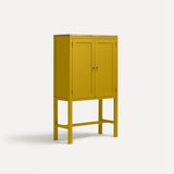Yellow painted two door shaker style cabinet on tall legs with oak work top. Shown at angle.