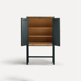 Blue Grey painted two door shaker style cabinet on tall legs with oak work top. Doors open revealing oak interior sliding shelf extended.