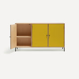 Three door ply wood contemporary side board with bright yellow painted doors (one open), black metal knobs and feet.