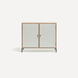 Two door ply wood contemporary side board with white painted doors, black metal knobs and feet.