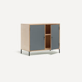 Two door ply wood contemporary side board with blue grey painted doors (one open), black metal knobs and feet. Shown at an angle.