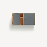 Two door ply wood contemporary wall cupboard with blue grey painted doors (one open showing internal shelf), black metal door knobs.