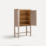 Pink painted two door shaker style cabinet on tall legs with oak work top. Shown at angle doors open revealing oak interior and shelves.