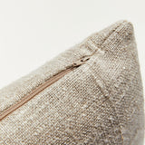 Close up of raw linen scatter cushion showing zip