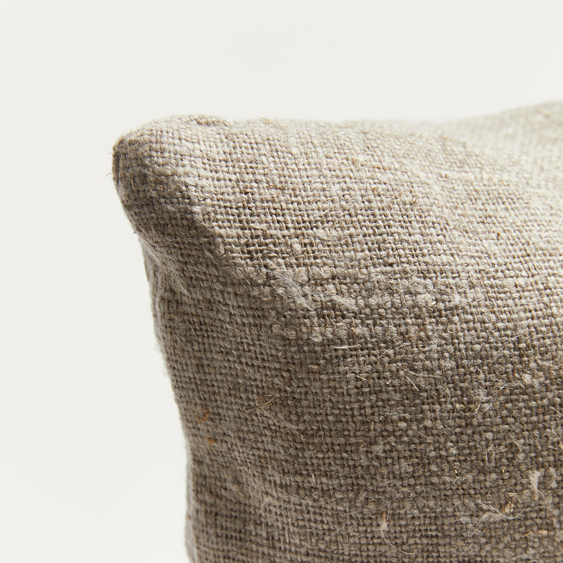 Close up of raw linen scatter cushion