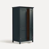 Dark Blue Grey painted freestanding tall Armoire cupboard Shaker style with panelled doors and black metal knobs. Shown at angle with one door open.