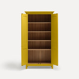 Yellow painted freestanding tall cupboard Shaker style with panelled doors black metal knobs. One door open revealing oak interior and four shelves. Both doors open revealing oak interior and four shelves.