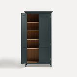 Dark grey blue painted freestanding tall cupboard Shaker style with panelled doors black metal knobs. One door open revealing oak interior and four shelves.