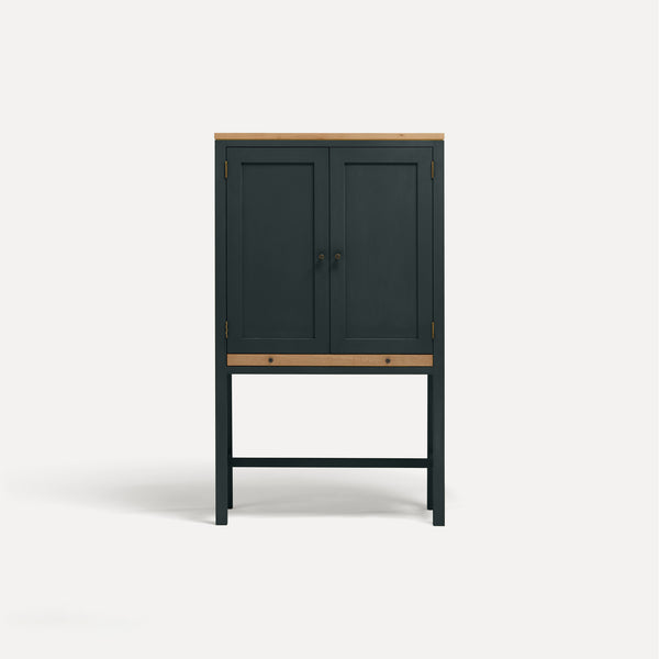 Blue Grey painted two door shaker style cabinet on tall legs with oak work top. 