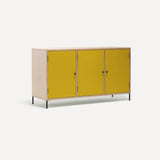 Three door ply wood contemporary side board with bright yellow painted doors, black metal knobs and feet. Shown at an angle.